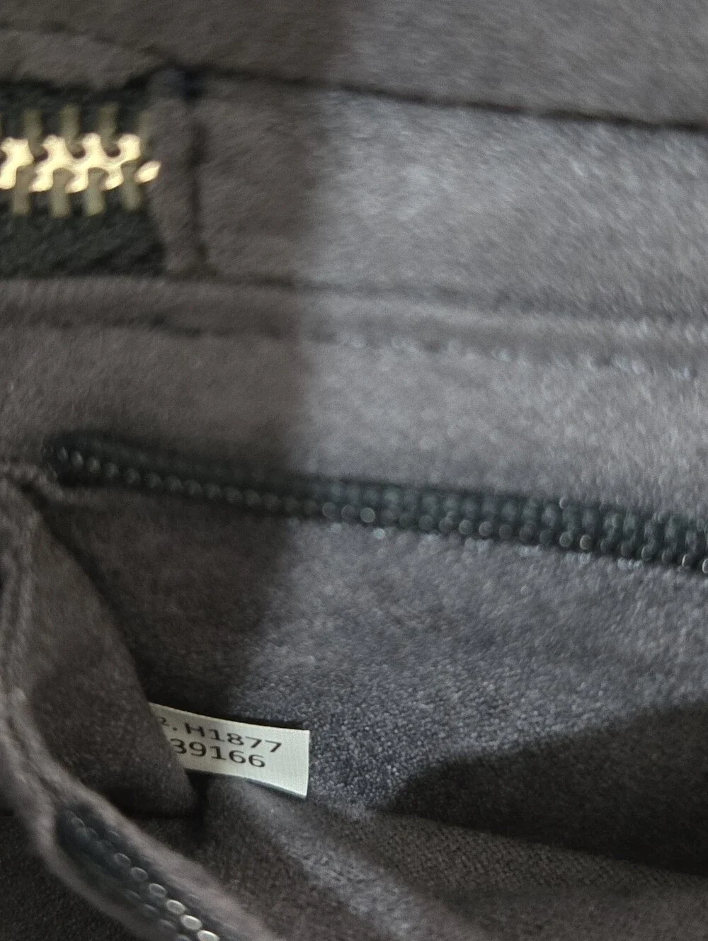 Coach length pouch handle